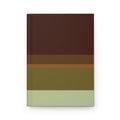 Notebook with horizontal stripes in brown, green, and beige on a black background