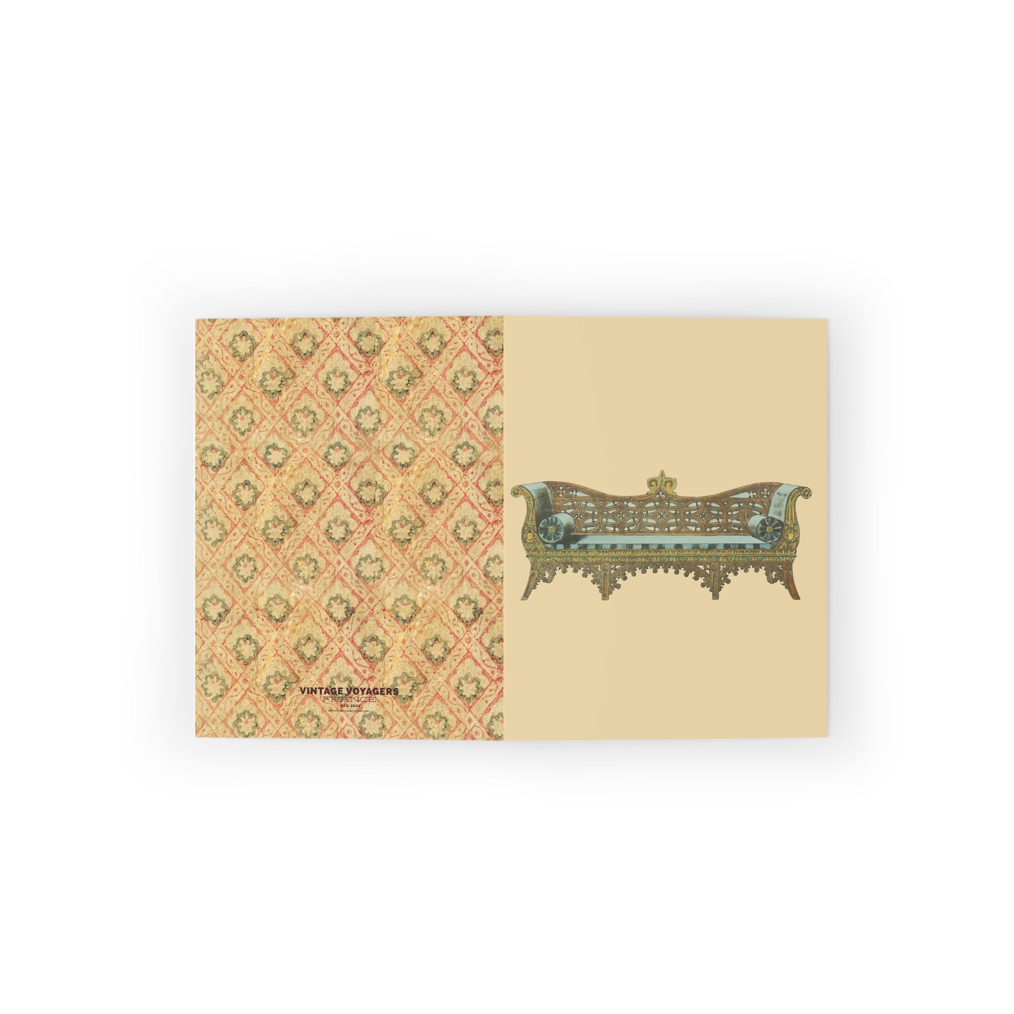 Notebook with vintage-style cover design on a white background
