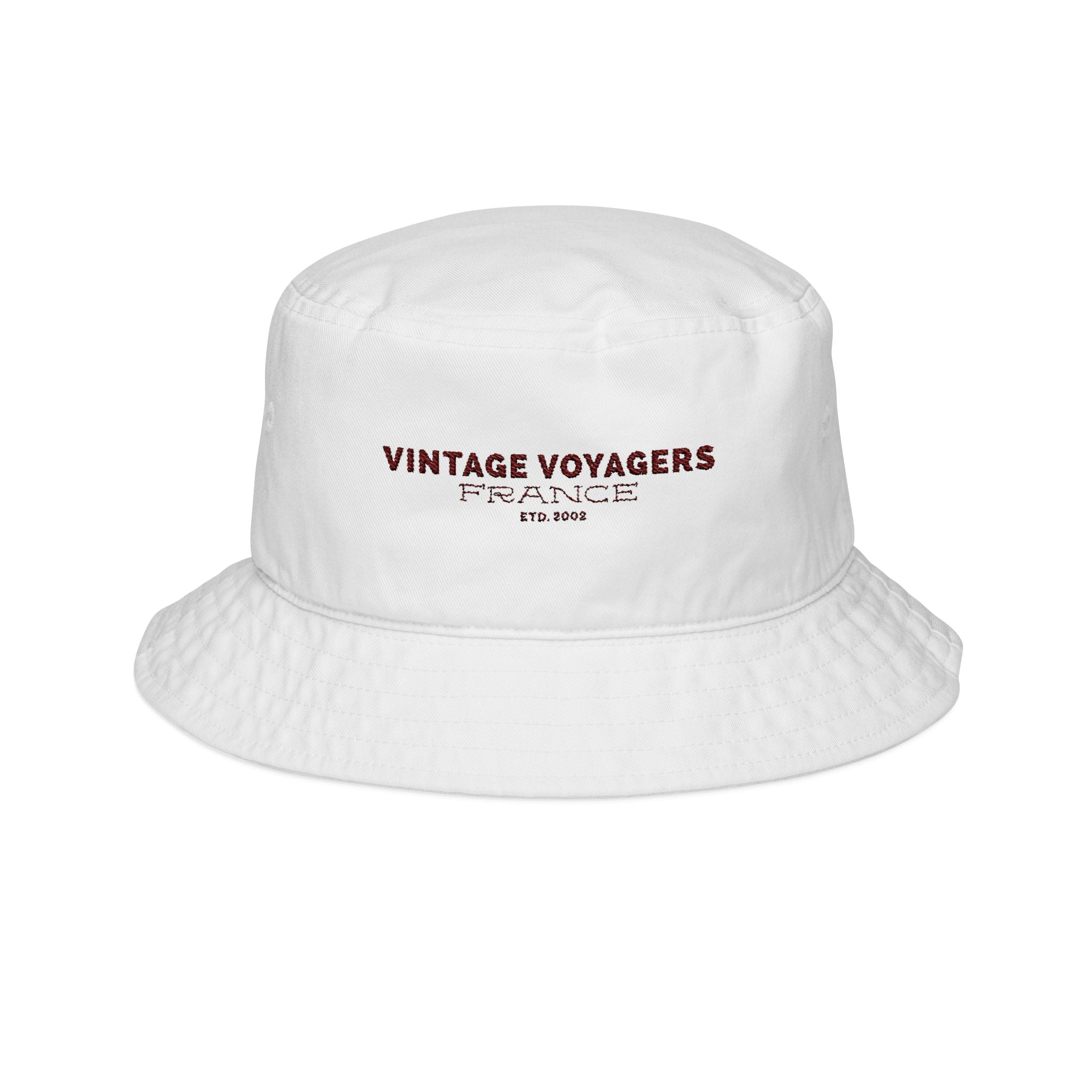 White bucket hat with 'Vintage Voyagers France' text on a white background