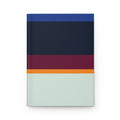 Notebook with color-blocked design on a white background