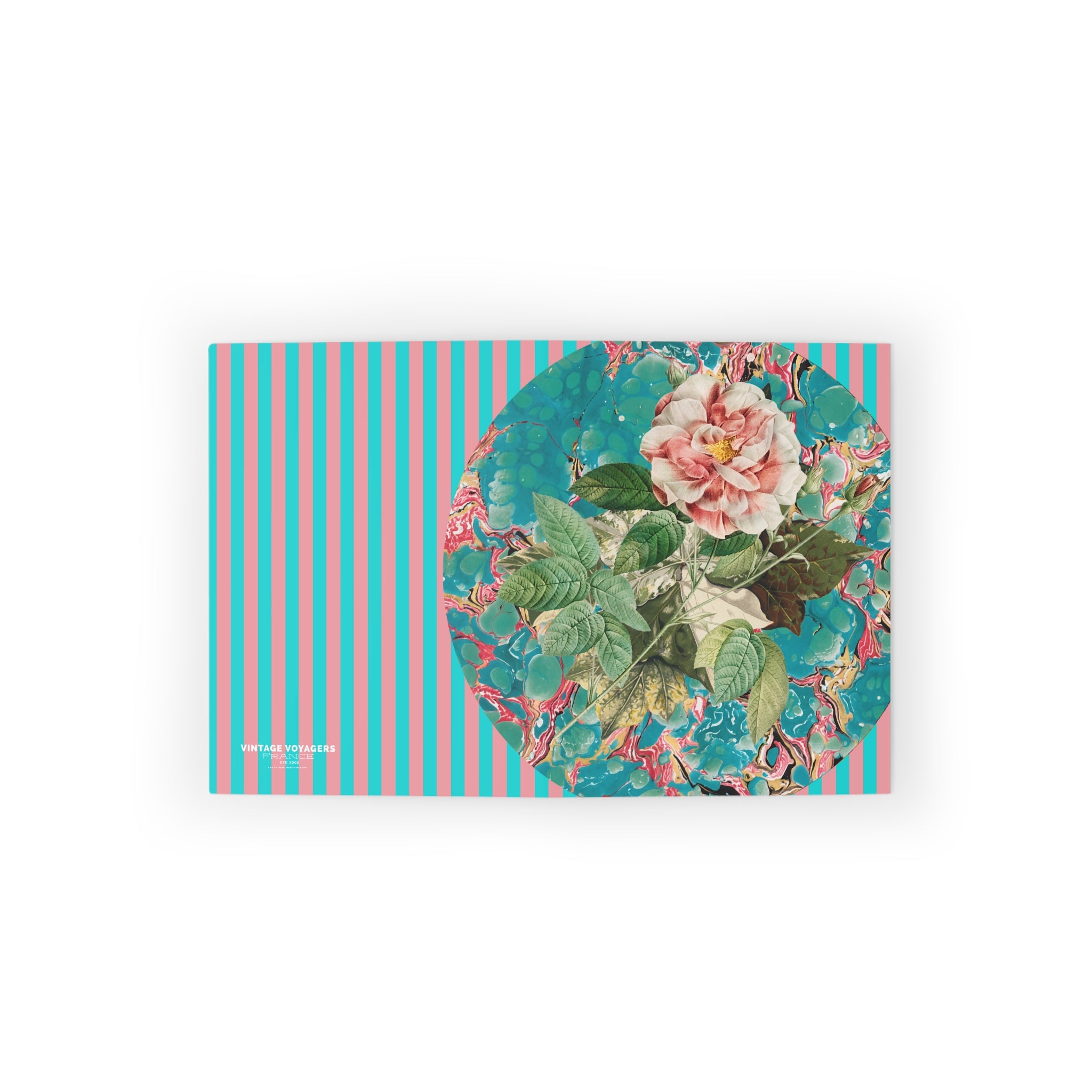 Notebook with floral design on a striped cover against a white background
