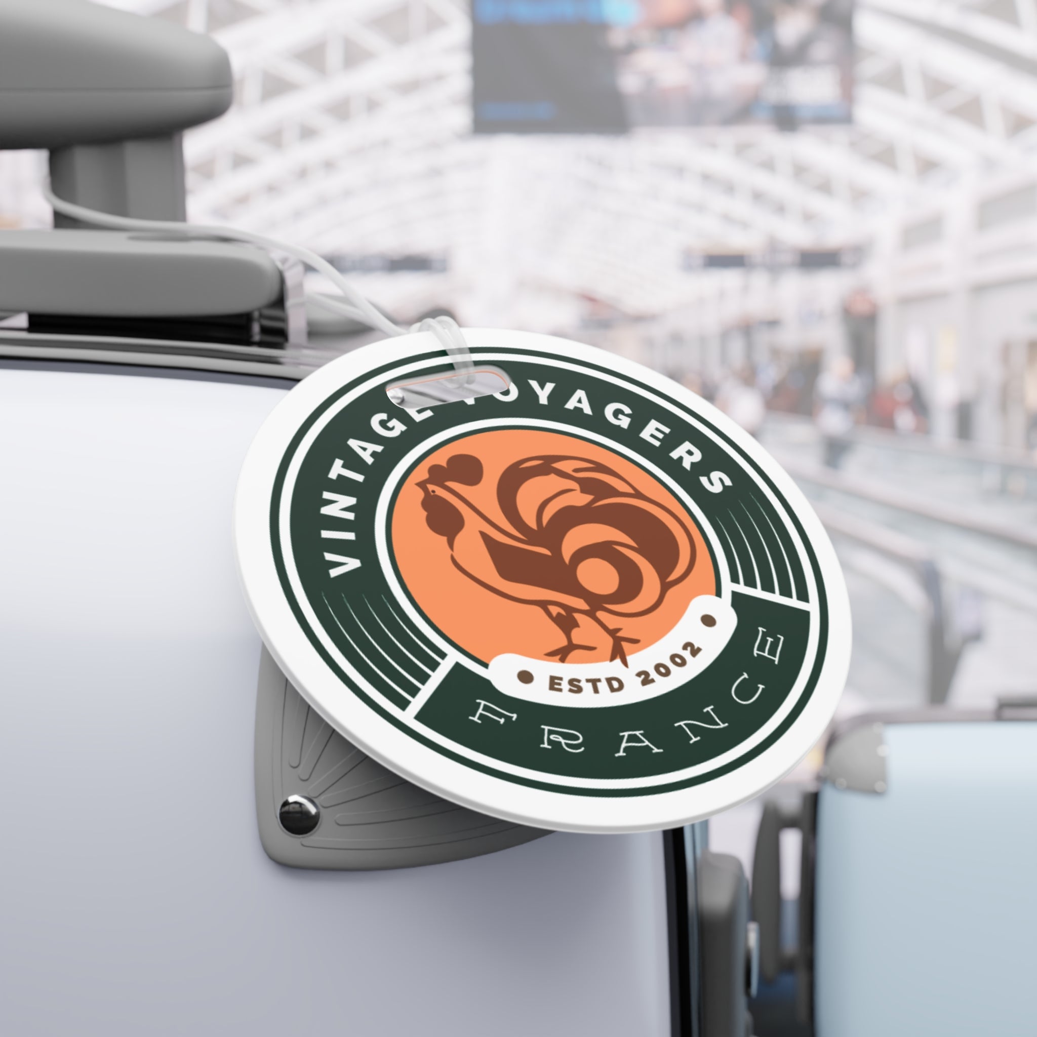 Vintage Yagers France logo on a luggage tag in an airport