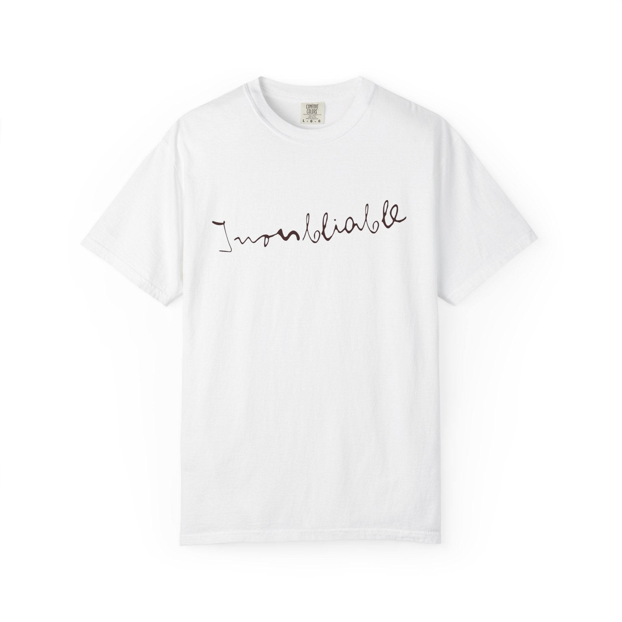 White t-shirt with 'Inoubliable—Unforgettable' text on a white background