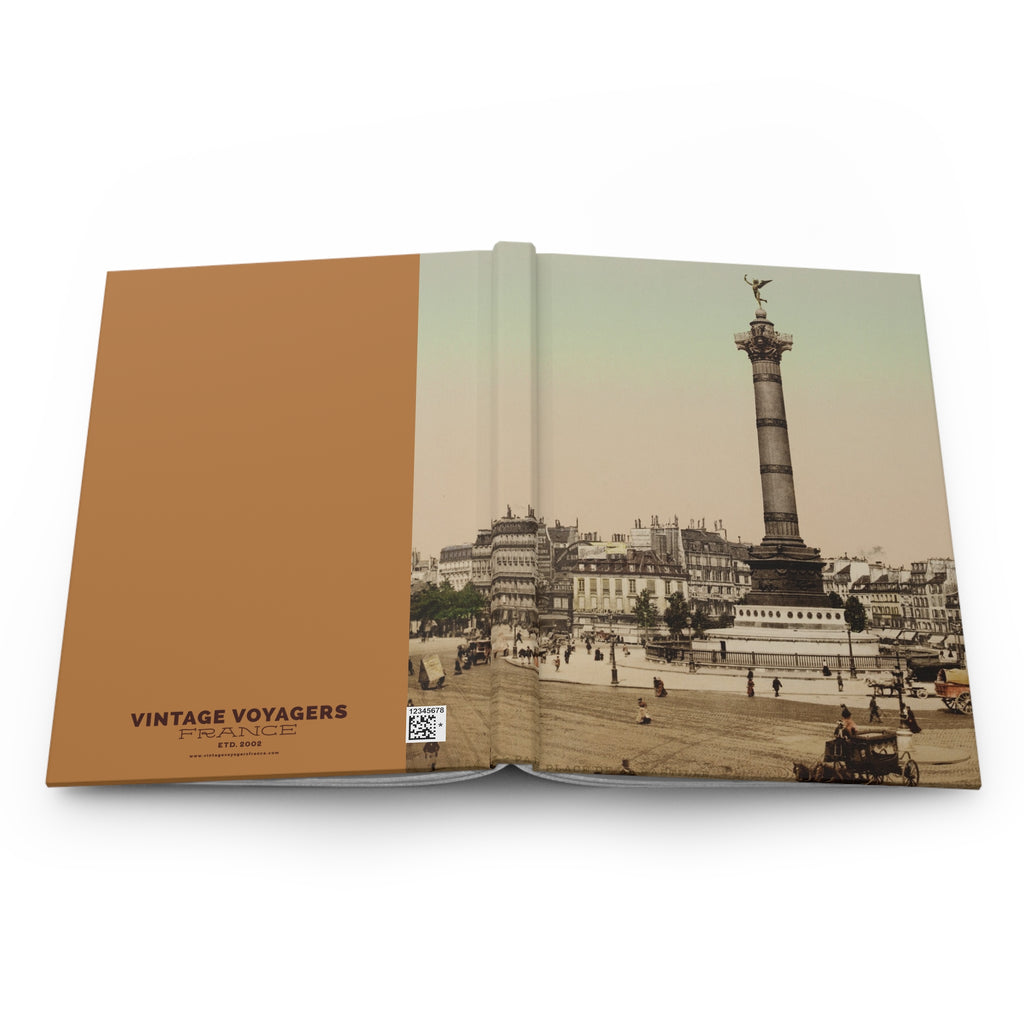 Open book with vintage photograph of a cityscape and column, titled 'Vintage Voyagers France'.