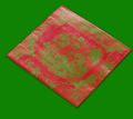 La Chinoiserie Noël cocktail napkin on a green ground — green garden scene on lacquer red