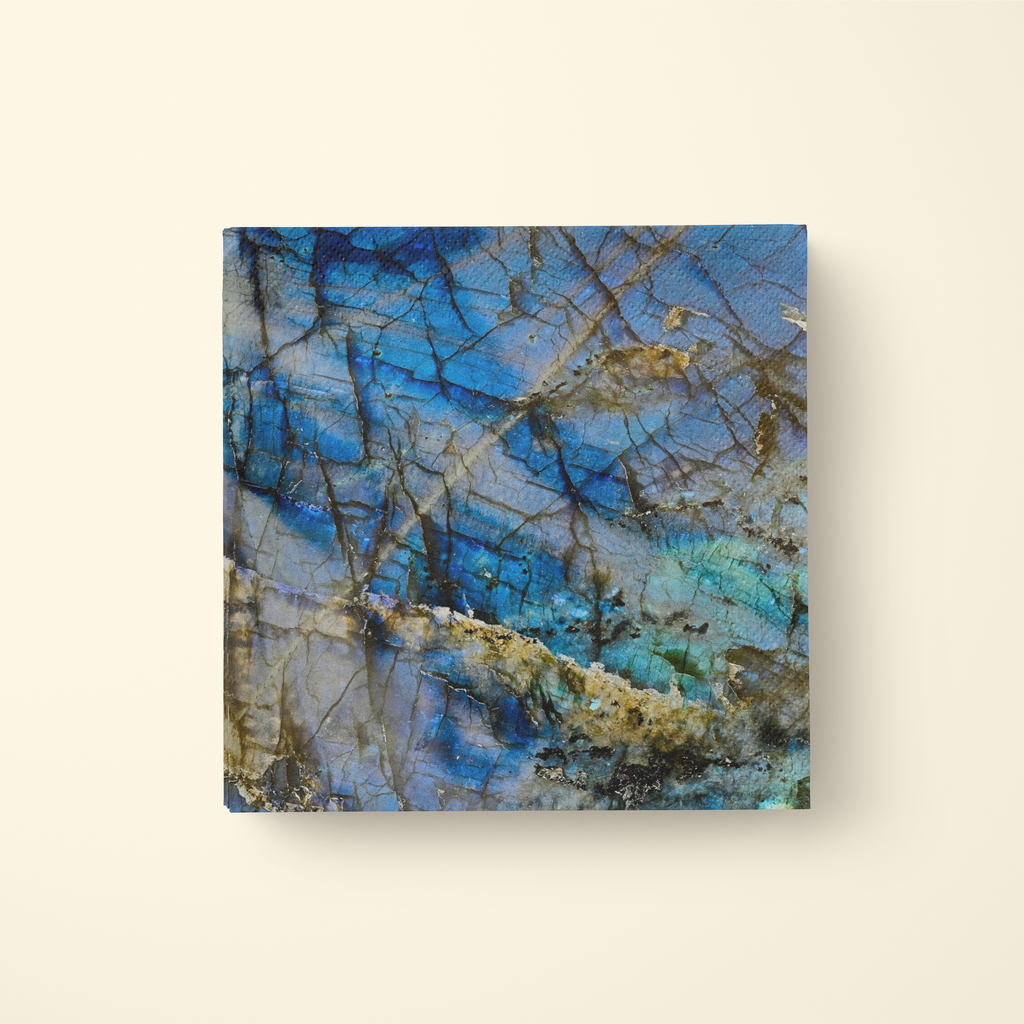 Single Lapis Lazuli cocktail napkin on cream