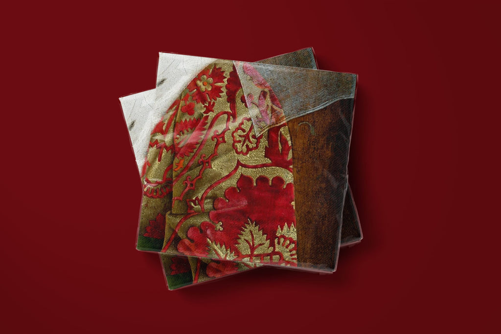 Noël Le Brocart paper napkins on a deep red ground — two napkins stacked