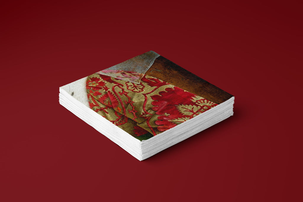 Noël Le Brocart paper napkins on a deep red ground — a stack of napkins