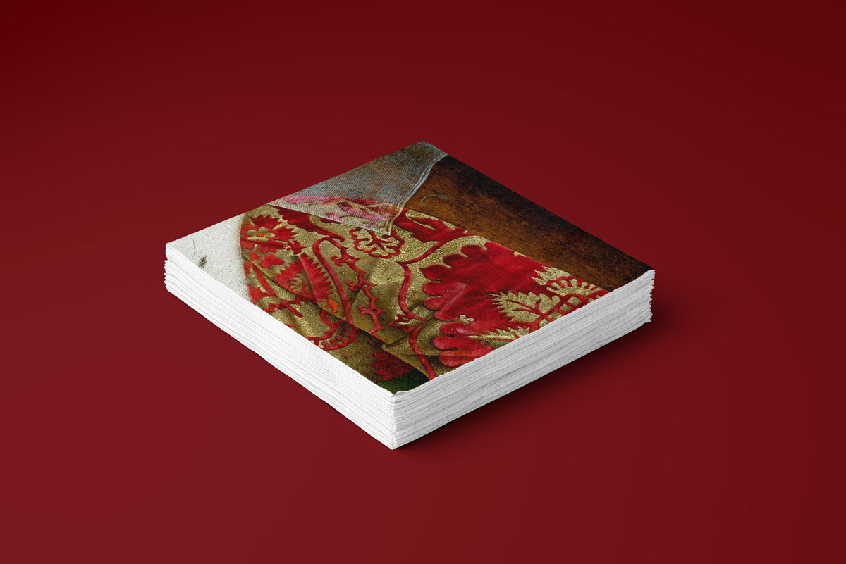 Noël Le Brocart paper napkins on a deep red ground — a stack of napkins