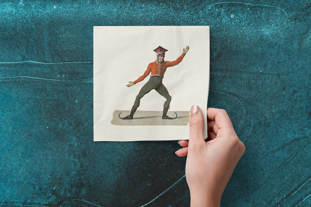 Noël L'Aplomb paper napkins on skating-rink ice — a napkin held in hand