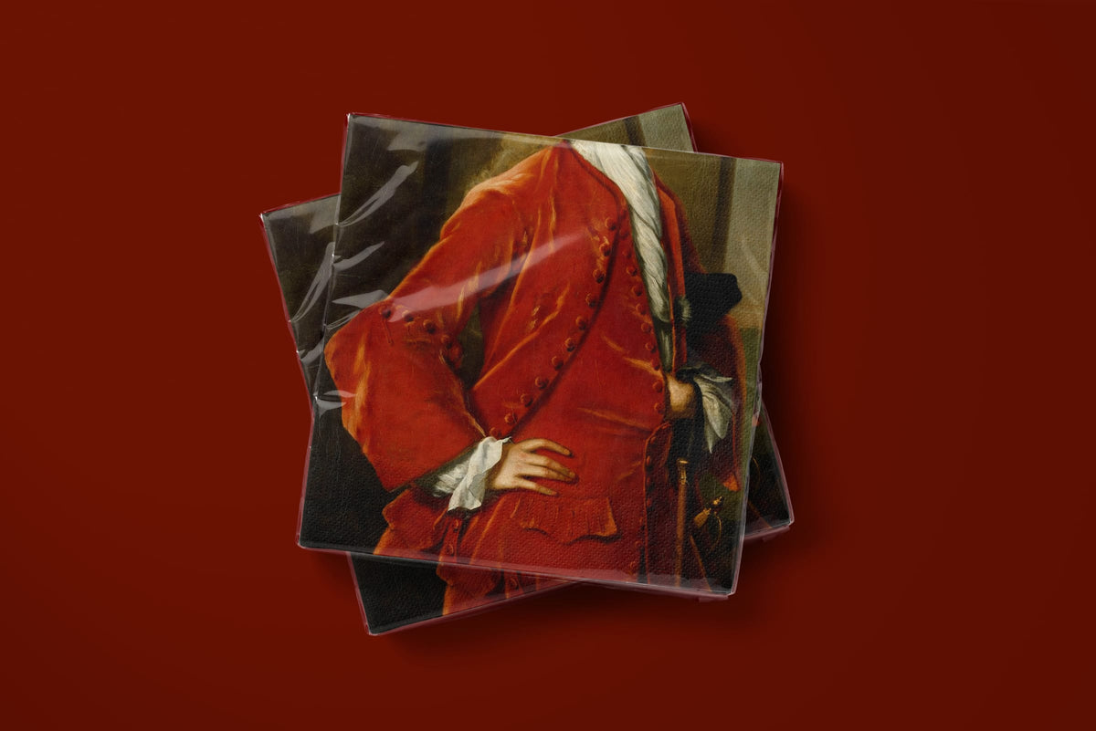 Noël L'Habit Rouge paper napkins on a deep red ground — two napkins stacked