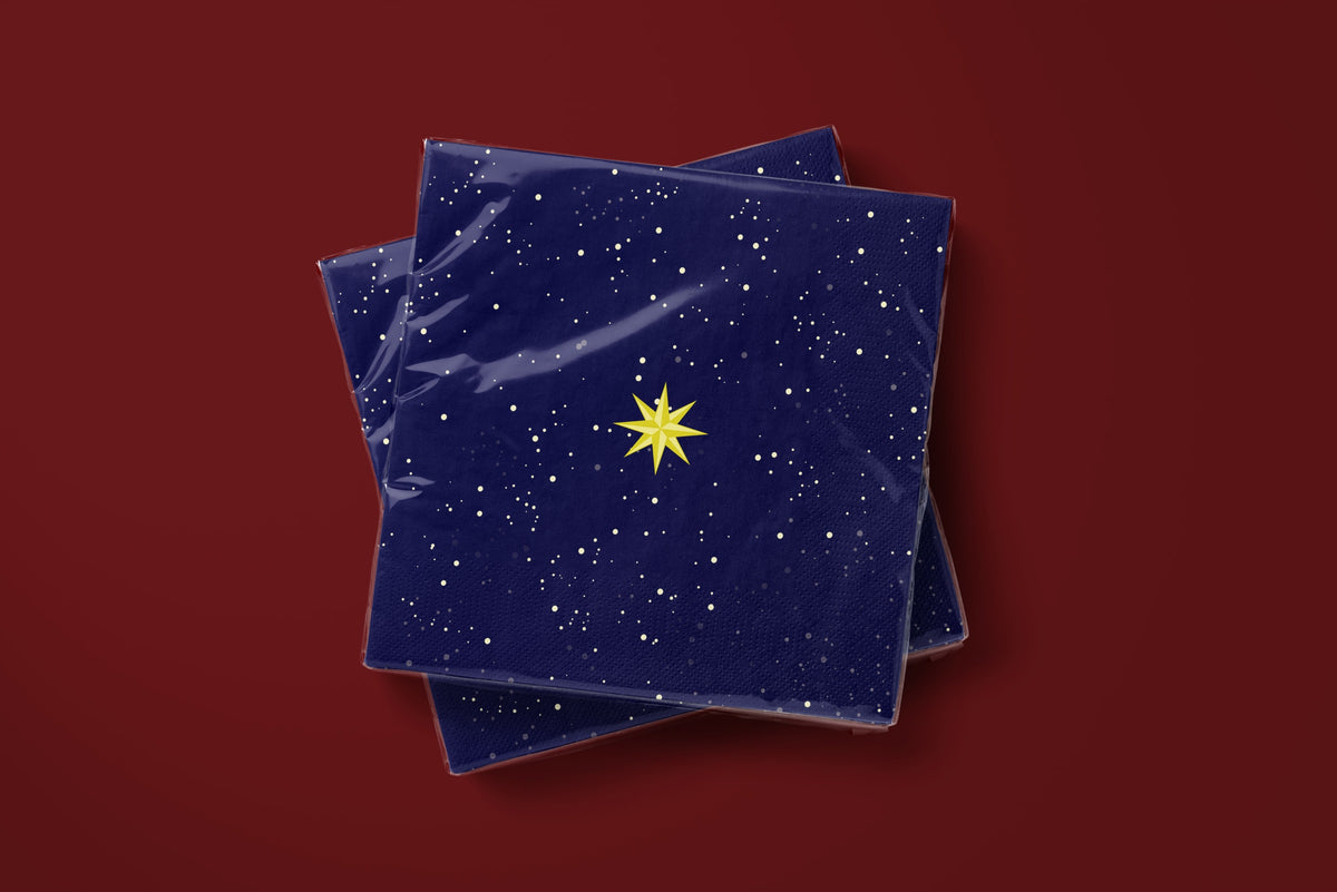Noël La Nuit Étoilée paper napkins on a deep red ground — two napkins stacked