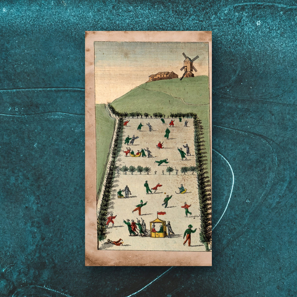 Noël La Patinoire paper guest towel — the full rink and windmill engraving, on skating-rink ice