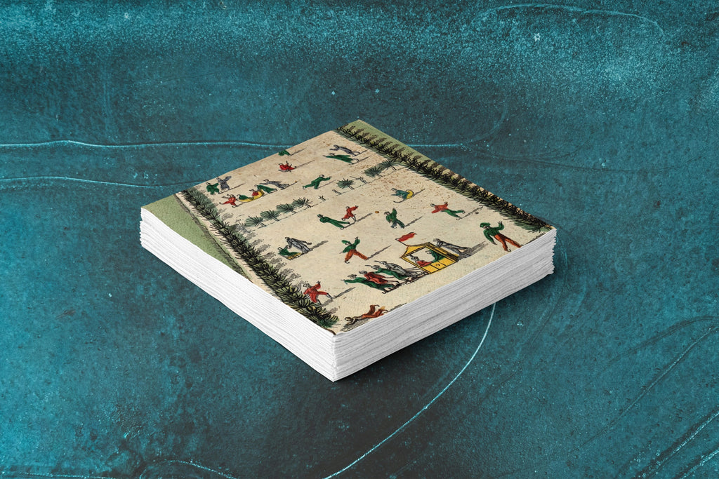 Noël La Patinoire paper napkins on skating-rink ice — a stack of napkins