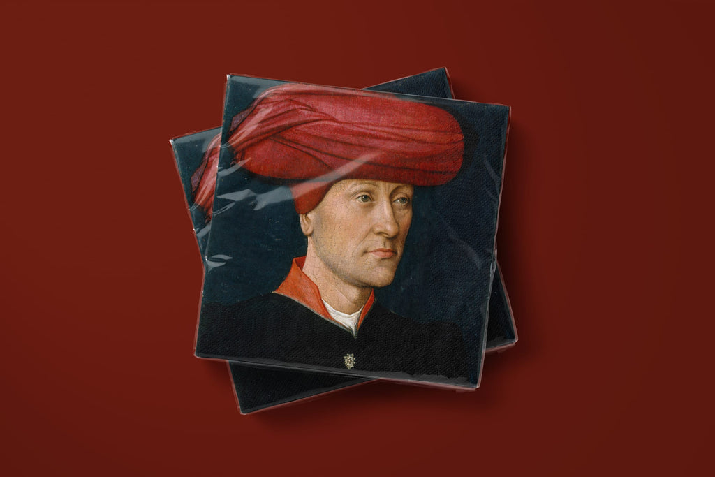 Noël Le Turban paper napkins on a deep red ground — two napkins stacked