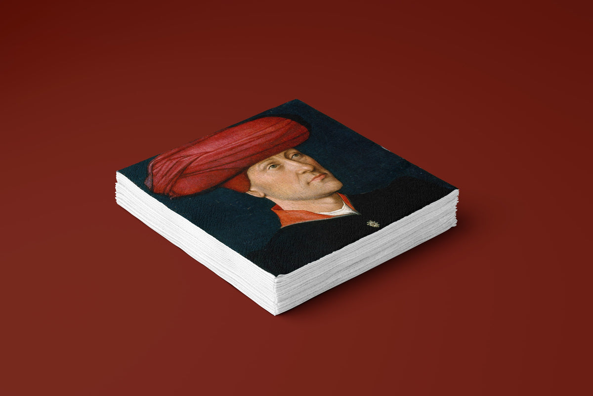 Noël Le Turban paper napkins on a deep red ground — a stack of napkins