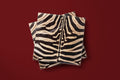 Vintage Voyagers France Noël Le Zèbre Paper Napkins — zebra print napkins on a deep red ground