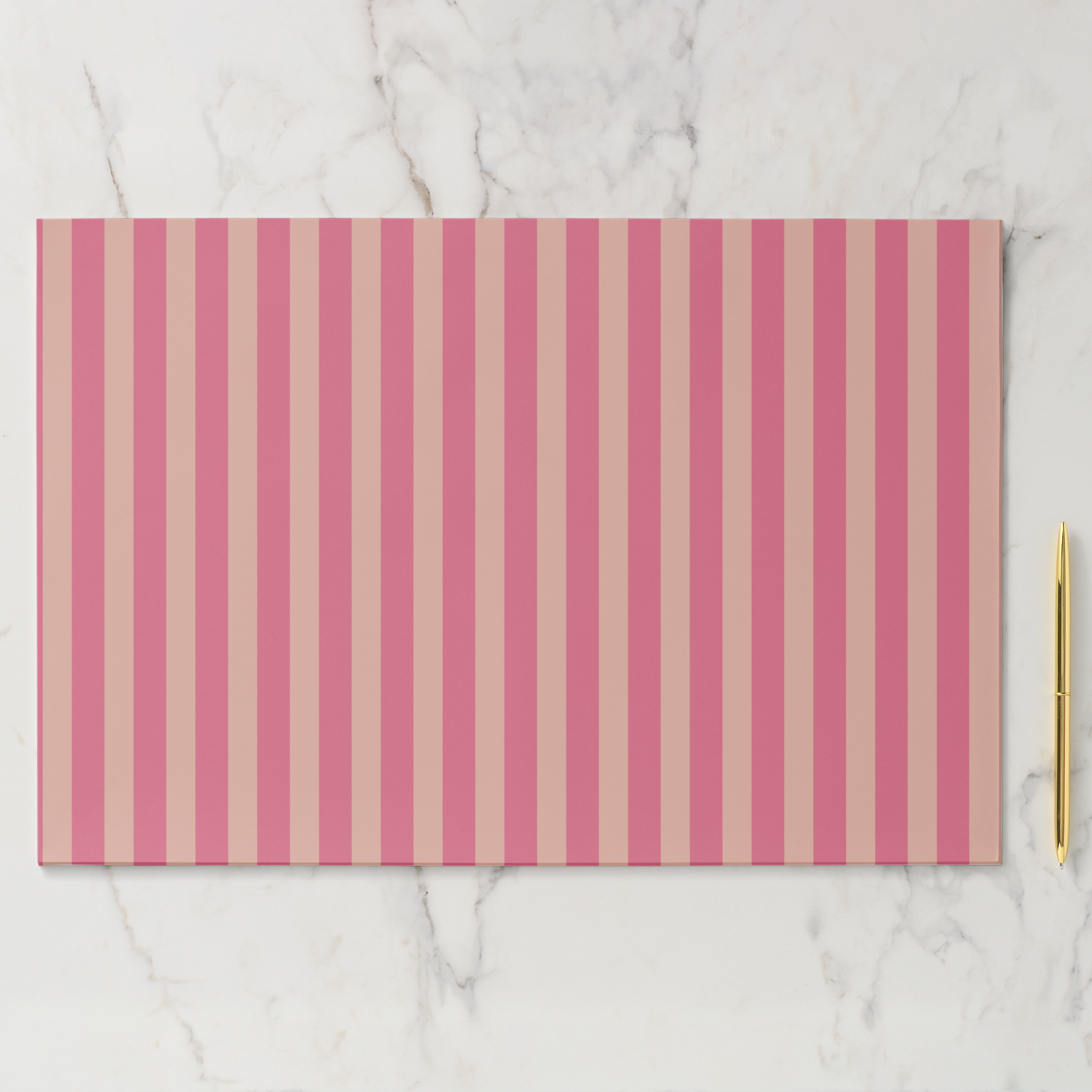 Placemat with pink and beige vertical stripes on a marble surface