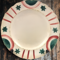 Decorative Paper plate plate with red and green patterns inspired by the French revolution