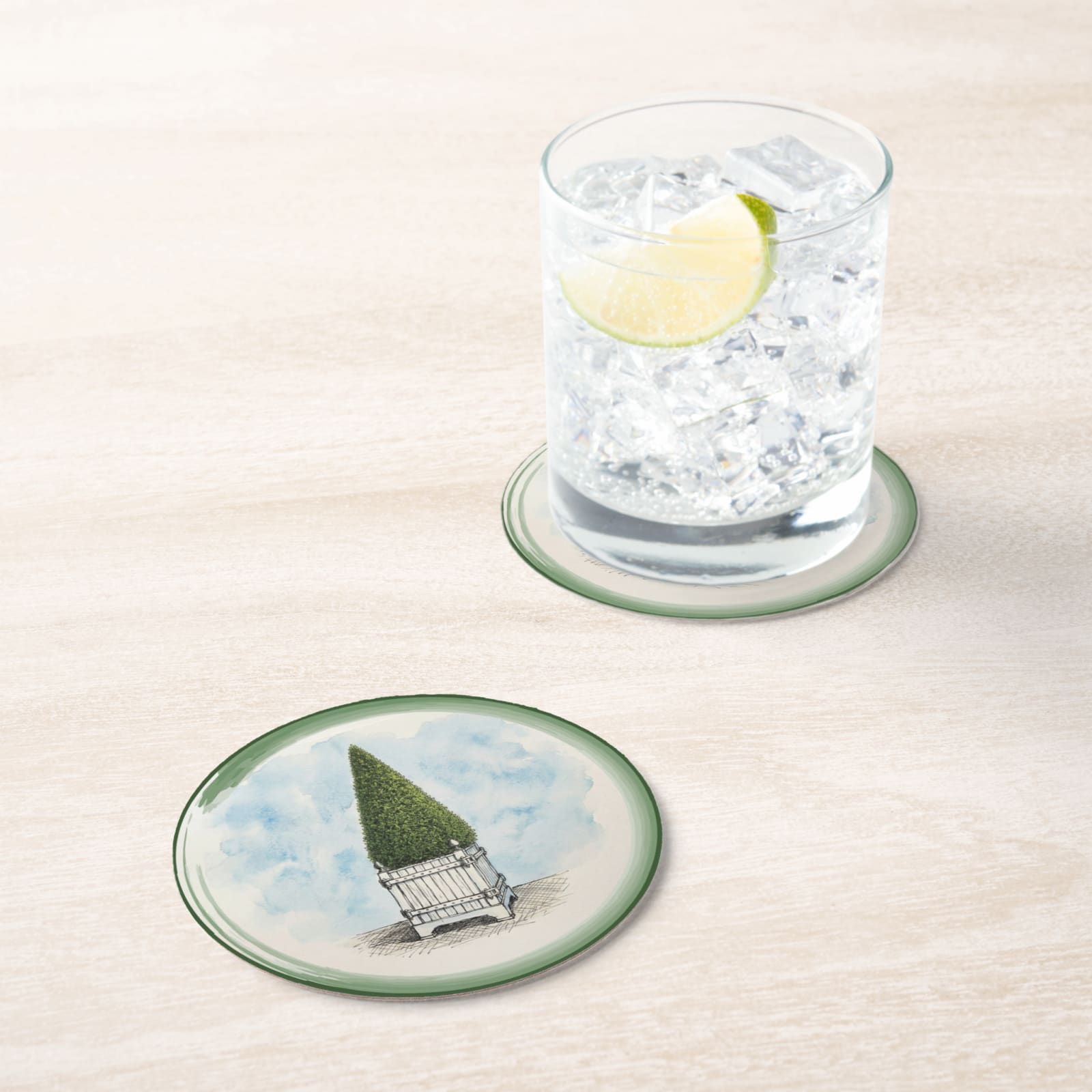 Le Jardin Français Cone Topiary Paper Coasters — in situ