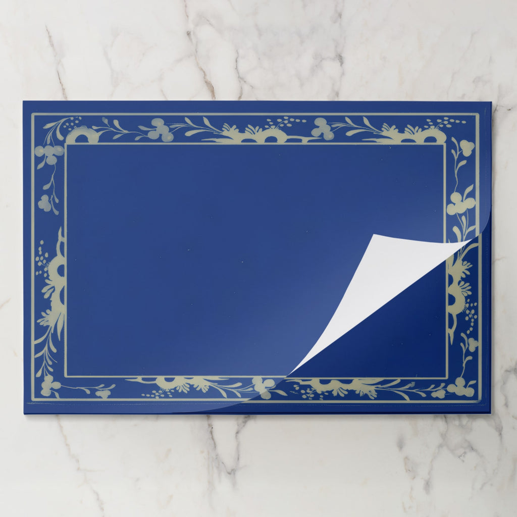 La Chinoiserie Bordure placemat pad in Cobalt, sheet lifted from the pad