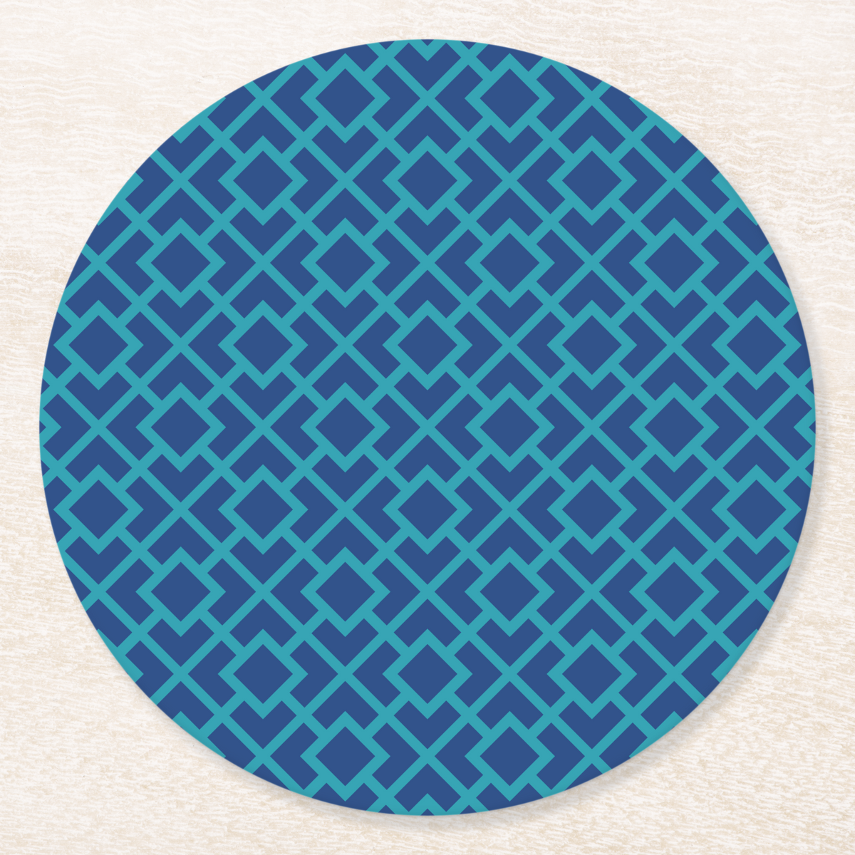 La Chinoiserie Lagoon Fretwork paper coaster, navy lattice on teal