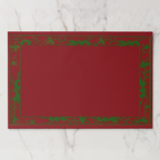 La Chinoiserie Bordure placemat pad in Noël — engraved border with an open centre, green on red
