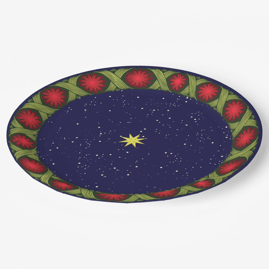 Noël La Tresse dinner plate at an angle — braided rim with rosettes over a starry navy ground