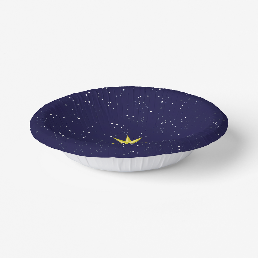 Noël L'Étoile bowl at an angle, its fluted wall visible — gold star on a starry navy sky