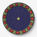 Noël La Tresse 9″ dinner plate — gold star on a navy night sky inside a braided green band with red rosettes