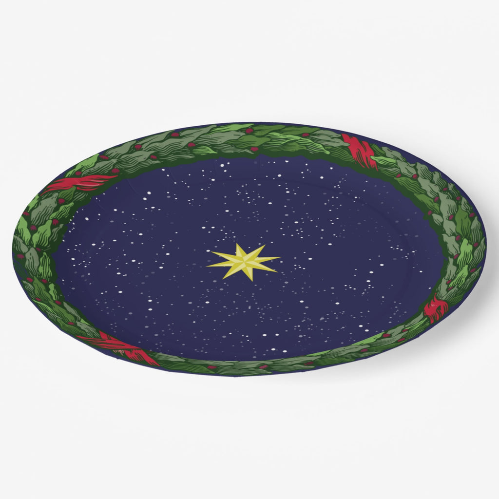 Noël La Nuit Étoilée dinner plate at an angle — laurel wreath rim over a starry navy ground