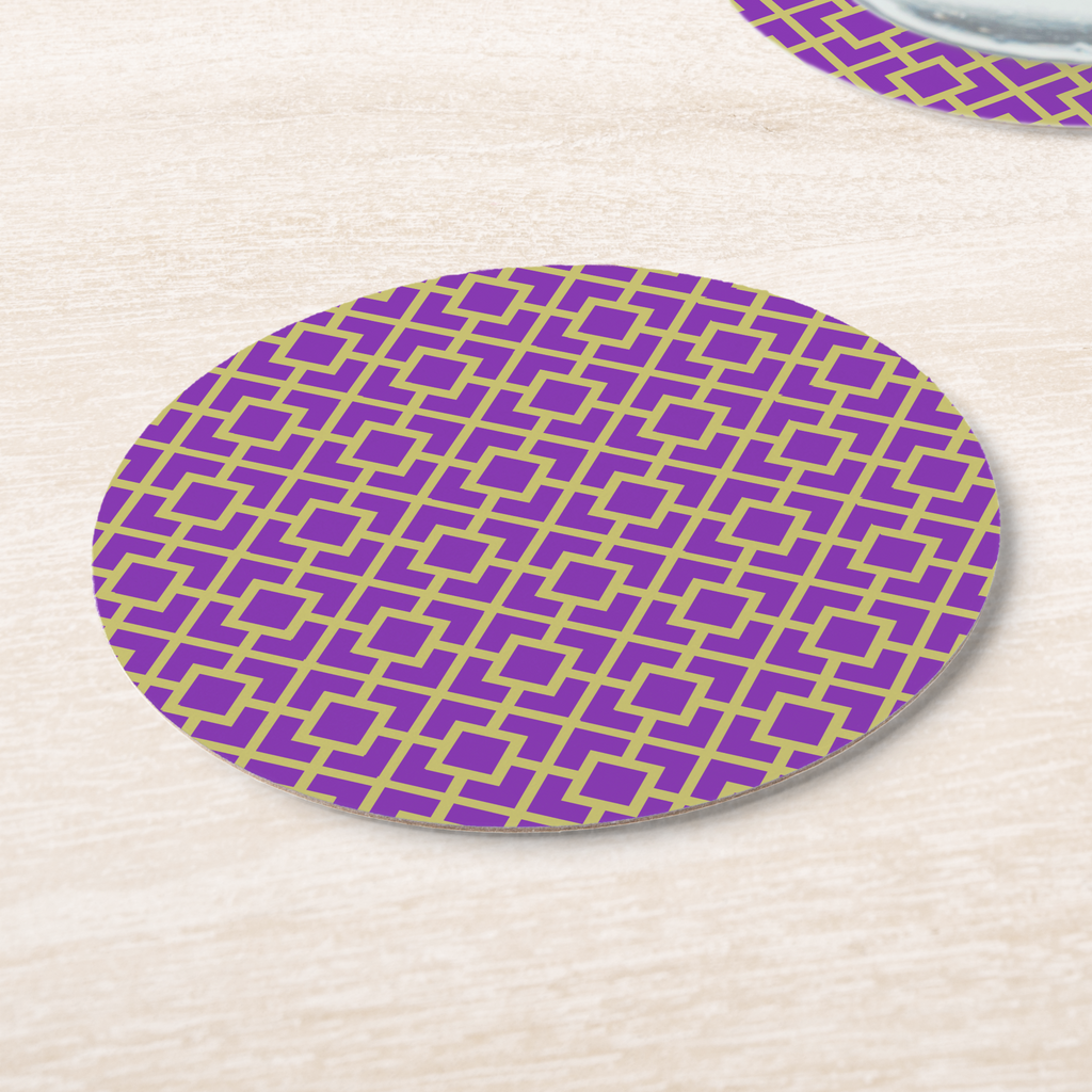 La Chinoiserie Violet Fretwork paper coasters on pale wood, violet lattice on chartreuse