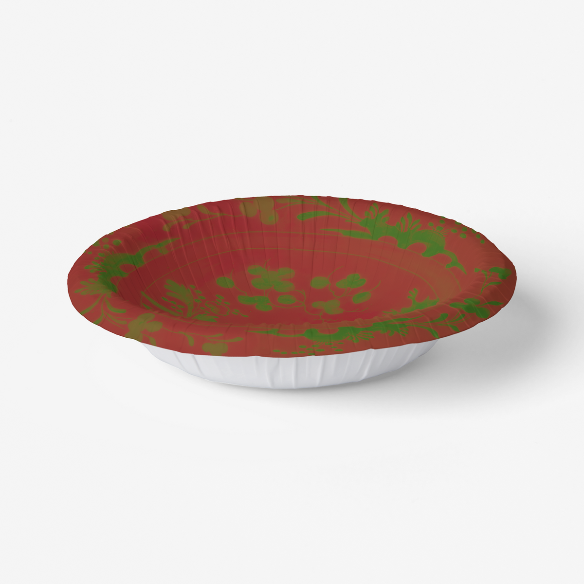 La Chinoiserie Noël bowl at an angle, its fluted wall visible — green garden scene on lacquer red