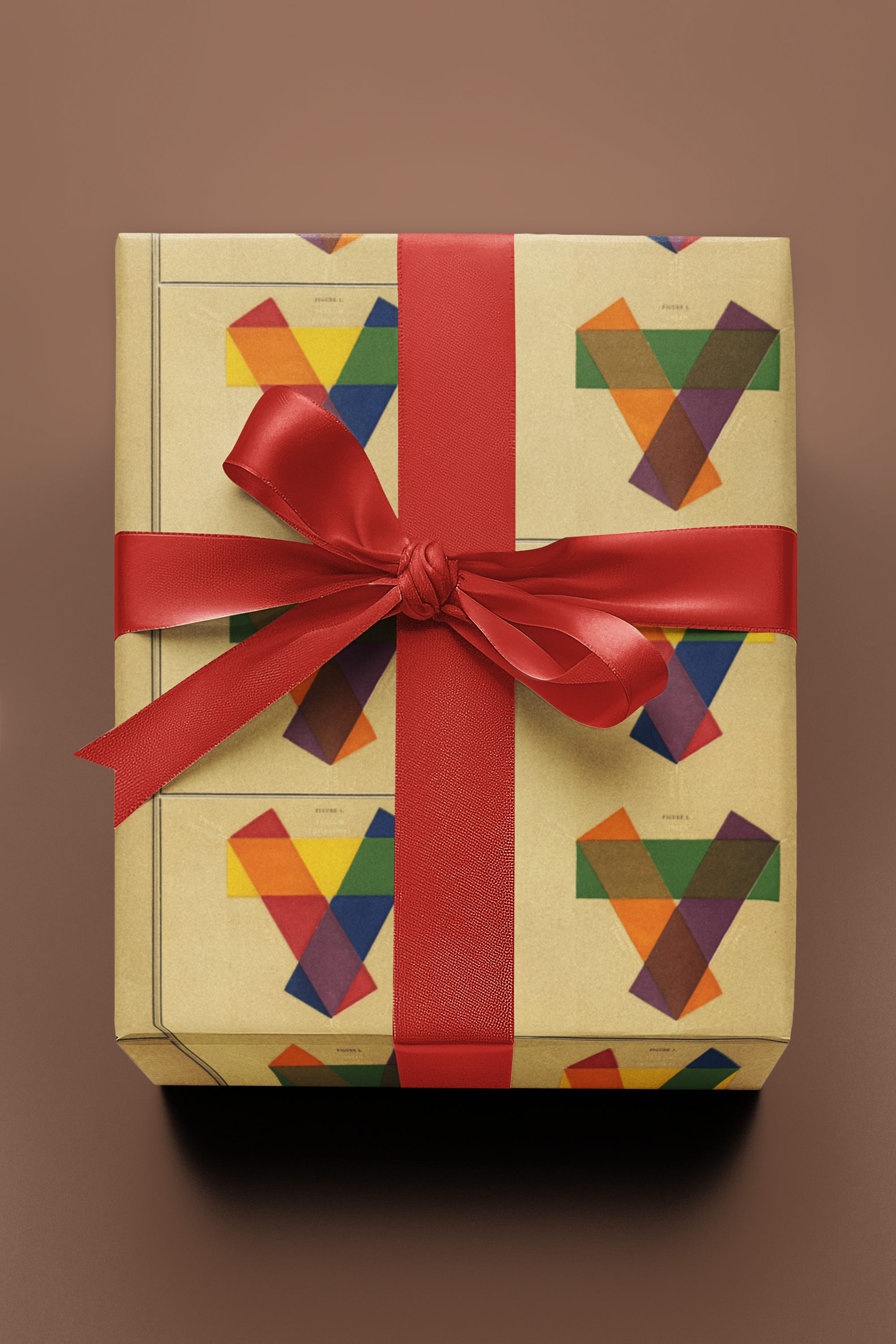 Gift box covered in artist notebook transparency wrapping paper with kraft ribbon
