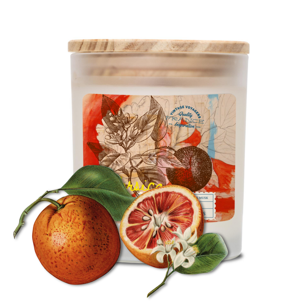 Parfum du Voyage Corsica Scented Candle — frosted glass vessel with orange illustration