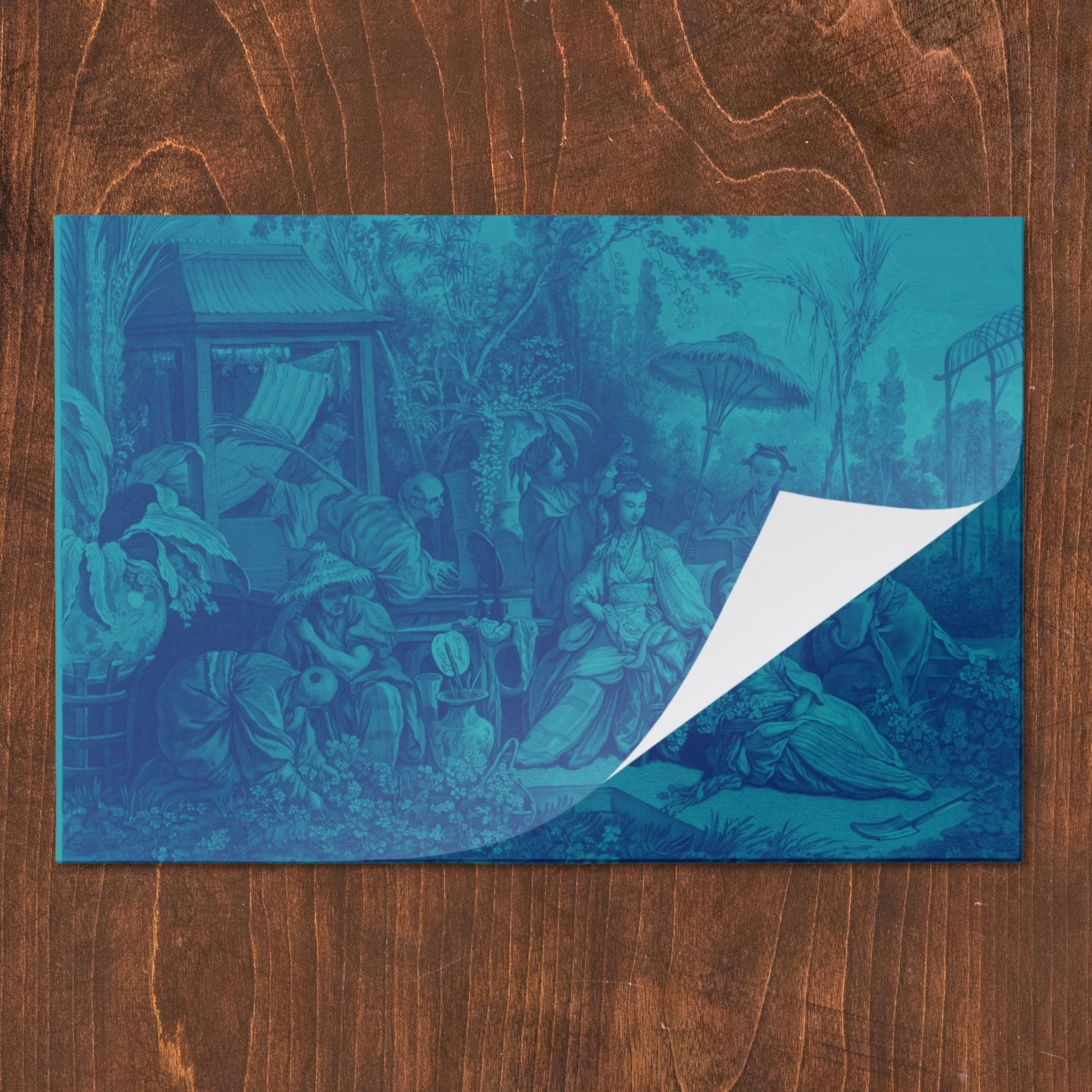 La Chinoiserie Lagoon chinoiserie garden-scene paper placemat, folded pad